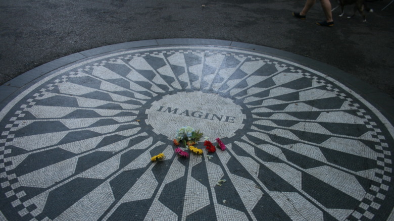 Cropped photo by Ian Gratton via Flickr of the John Lennon memorial in Central Park, https://creativecommons.org/licenses/by/2.0/