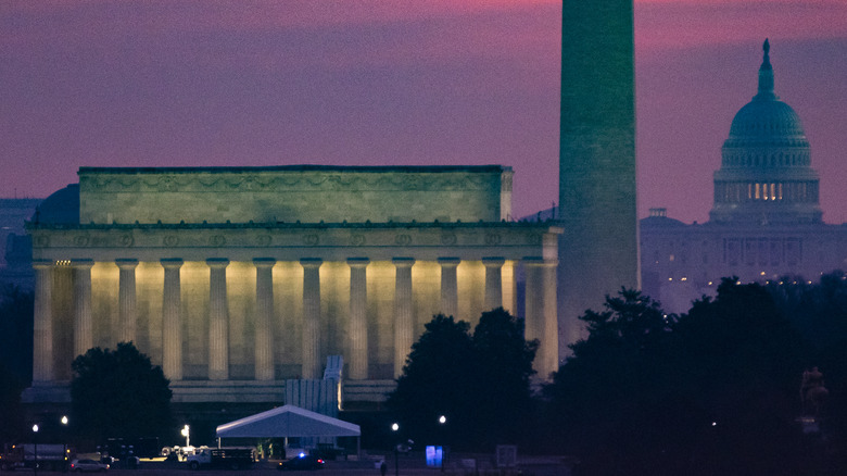 Lincoln Memorial and Washington Monument under purple sky