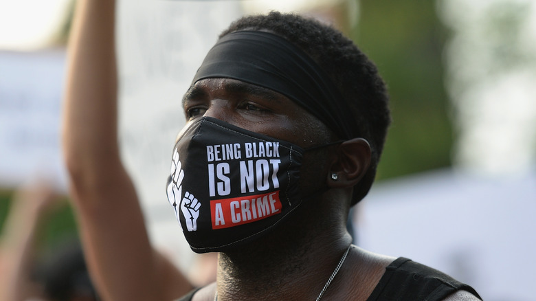 man wearing Black Lives Matter mask