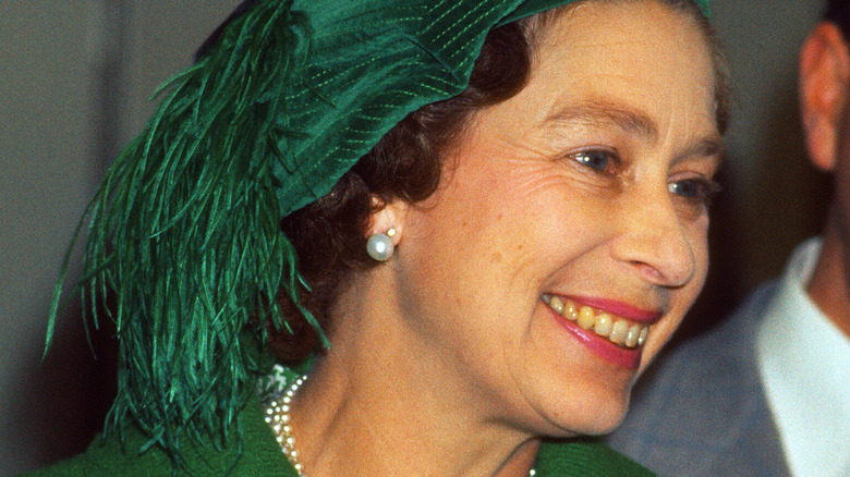 Elizabeth II in green coat and green hat