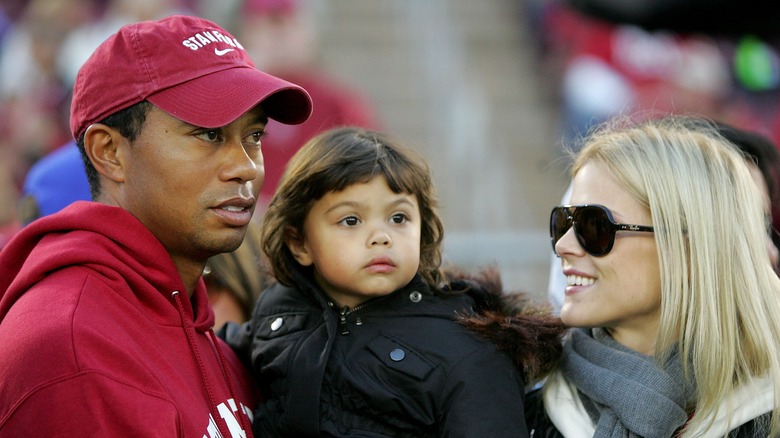 Tiger Woods and Elin Nordegren hold daughter Sam