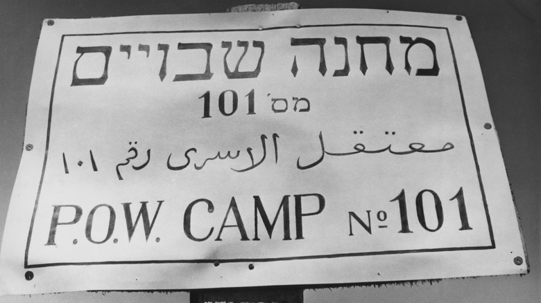 sign for POW Camp