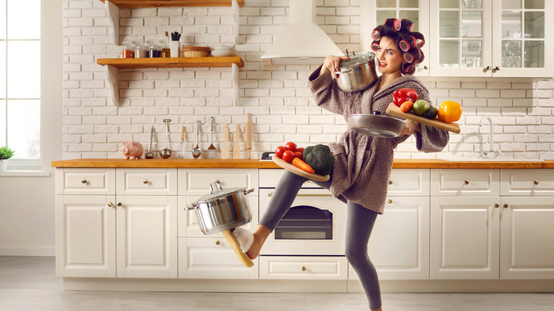 Housewife juggling housework