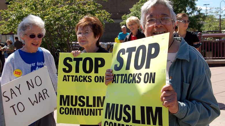 Anti-racism protestors in Minneapolis holding signs