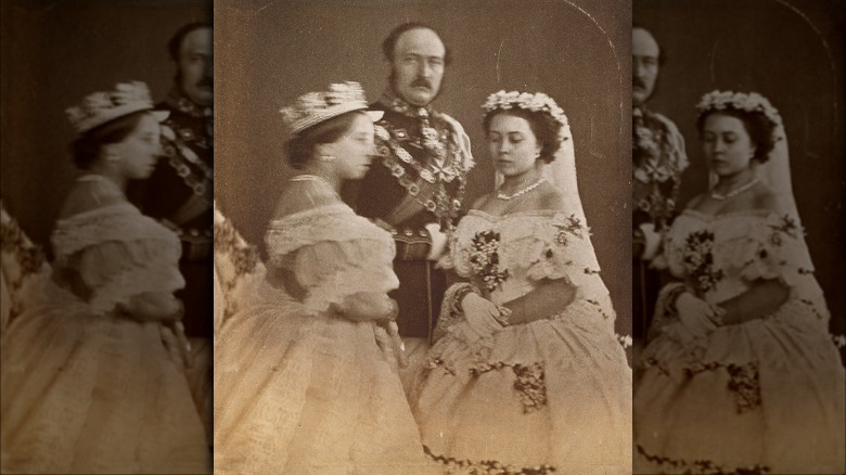 Queen Victoria, Albert and Princess Victoria wearing wedding dress