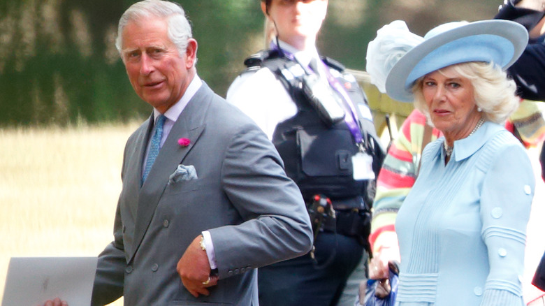 rince Charles and Camilla walking