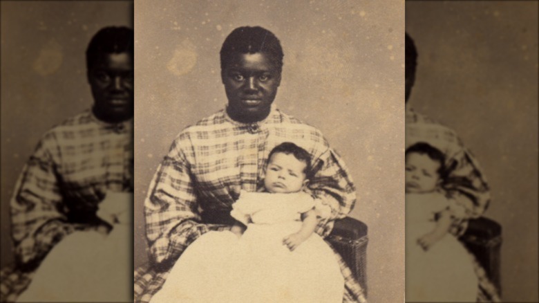 Photo of West Virginian slave Aunt Susan tending a baby