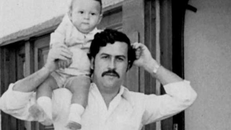 Pablo Escobar with a baby