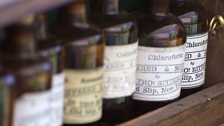 Antique chloroform bottles lined up