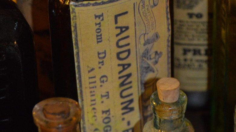 Laudanum bottle and blue and yellow lable