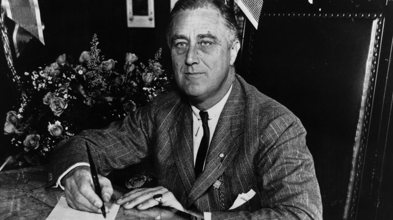 FDR signing a document
