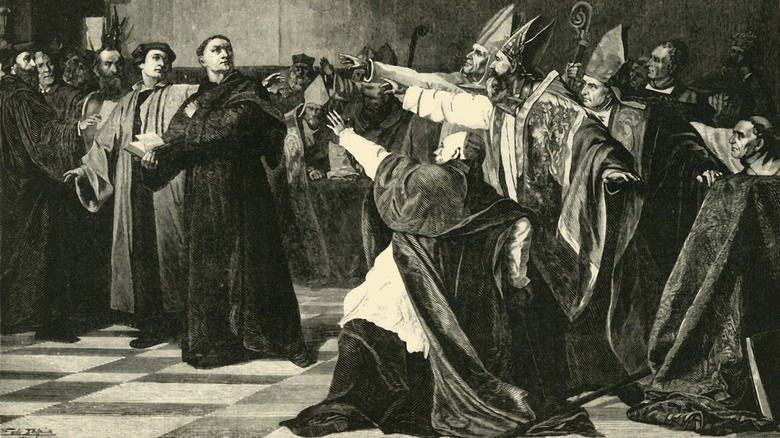 painting of Martin Luther being pointed at