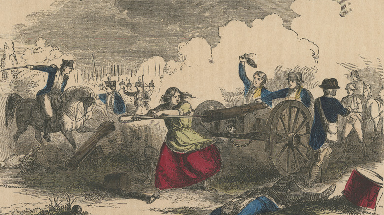 woman loading cannon during battle