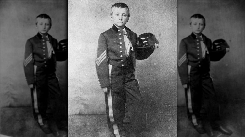 John Clem posing in uniform in 1865