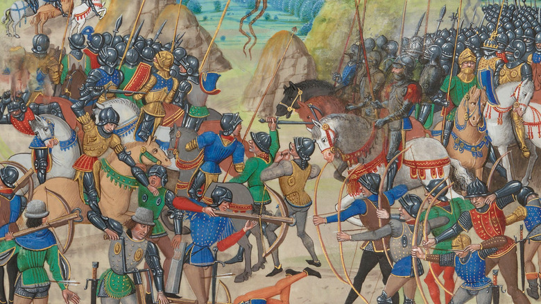 illustrated manuscript of battle of crecy with troops on horses