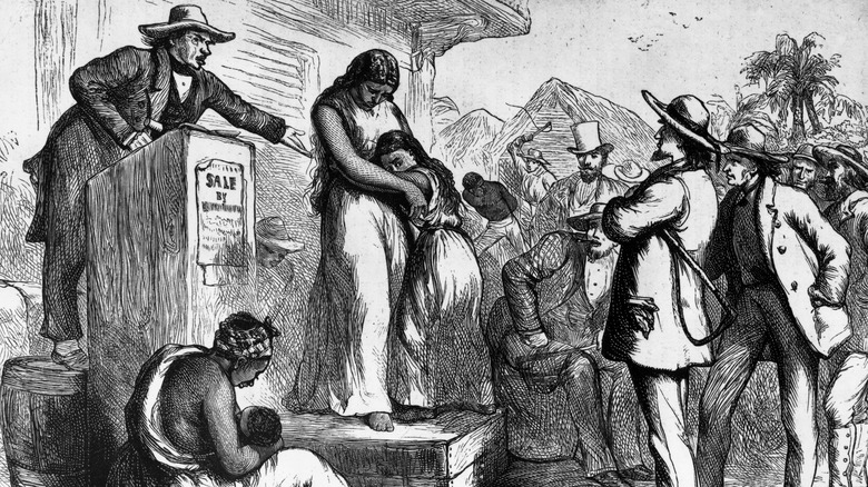 ink drawing of slaves being auctioned in America