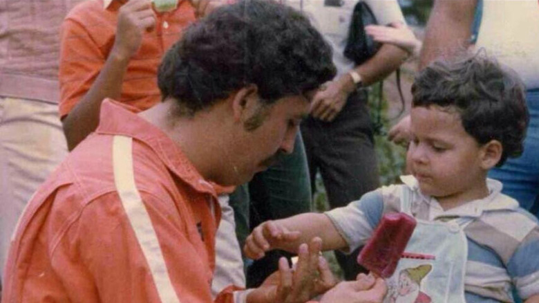 Pablo Escobar with a child