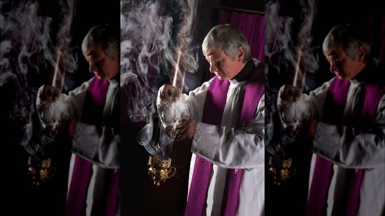 Priest in surplice and purple stole
