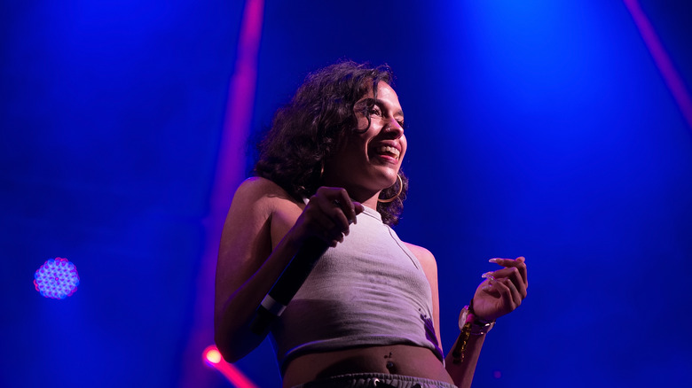 Princess Nokia on stage with a blue background