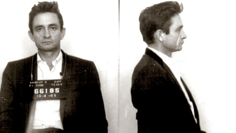 Johnny Cash poses for mugshot