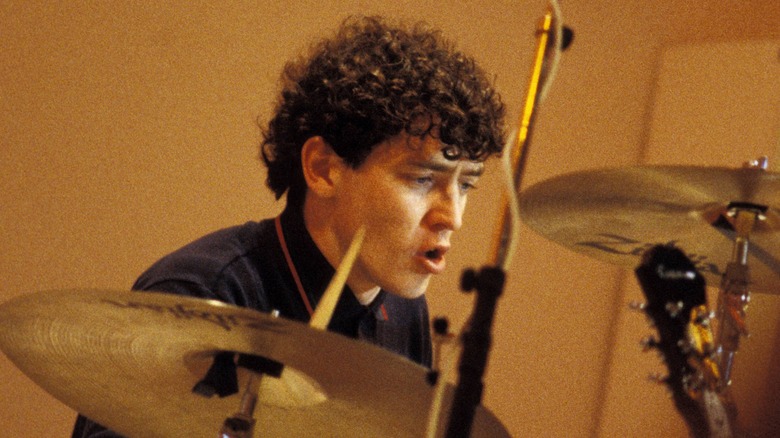Tony McCarroll playing the drums