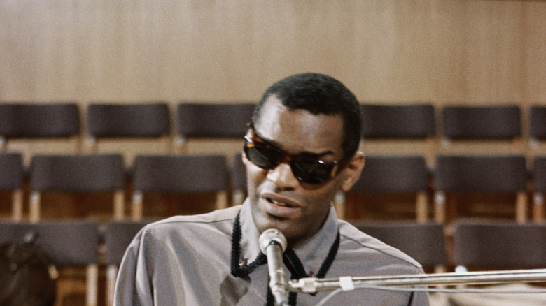 portrait of Ray Charles at the piano in 1964