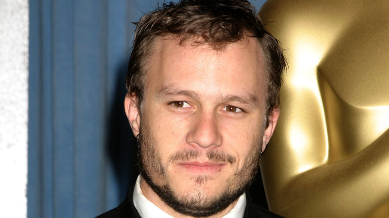 Heath Ledger with Oscar statue in background