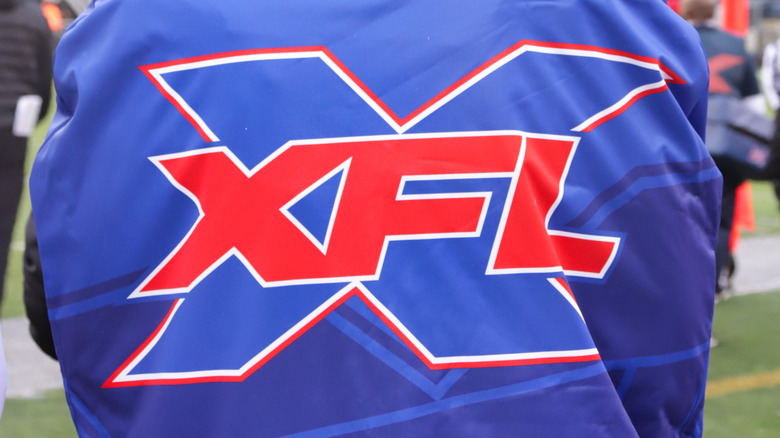 Player wearing an XFL jacket at a 2020 game