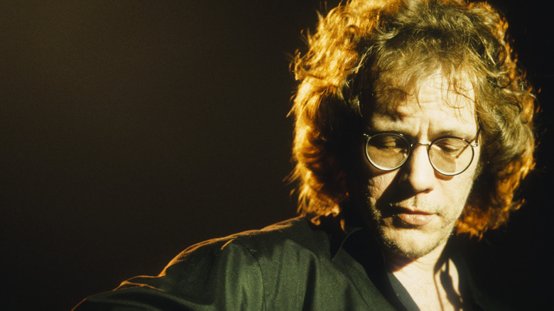 Warren Zevon performing onstage