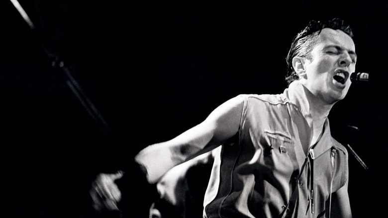 Joe Strummer of The Clash performing onstage