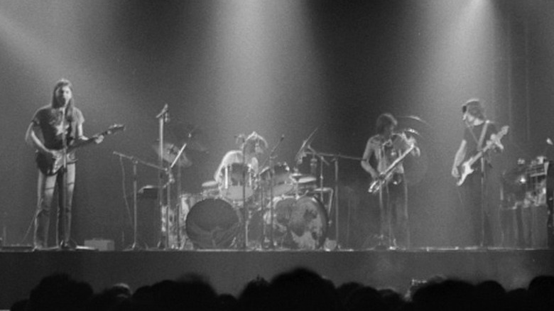 Cropped photo by TimDuncan of Pink Floyd onstage in 1973, CC BY 3.0