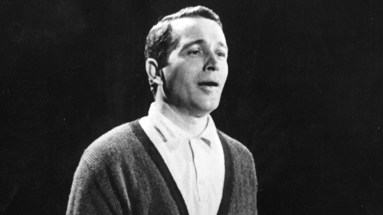 Perry Como standing and singing