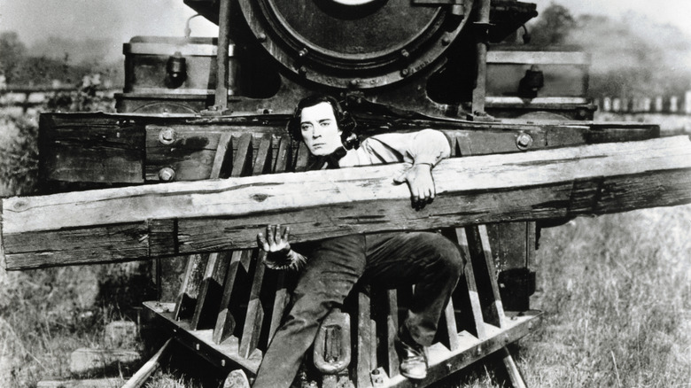 Buster Keaton on the front of a train