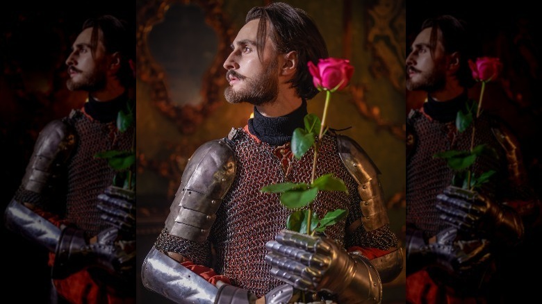 Chivalrous knight holding flowers