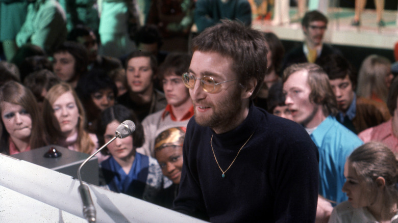 John Lennon performing