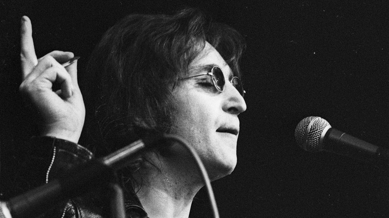 John Lennon performing