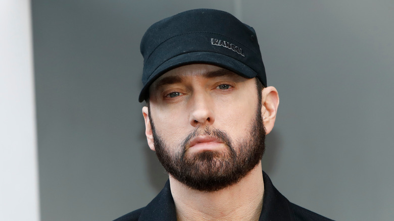 Eminem wearing a hat