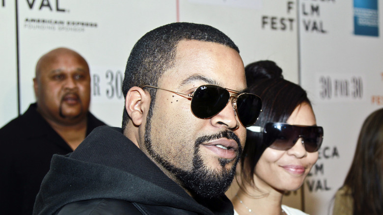 Ice Cube and wife at movie premiere