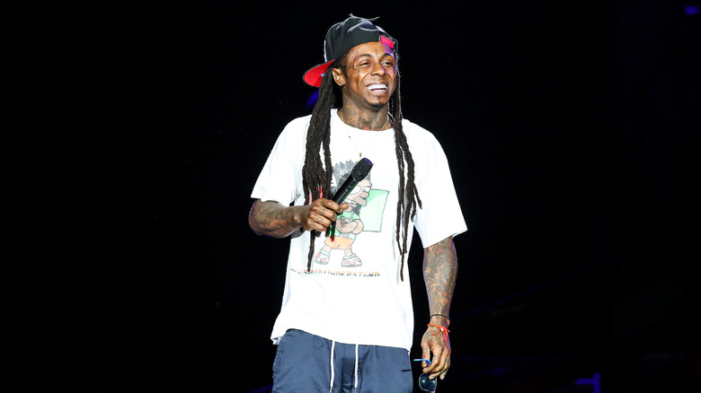 Lil Wayne smiling onstage