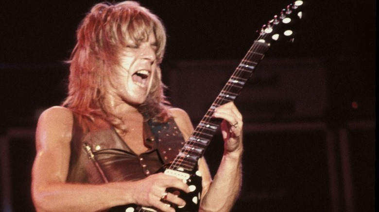 Randy Rhoads with his polka dot Sandoval flying V guitar