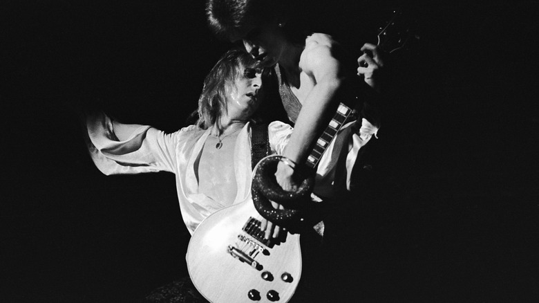David Bowie and Mick Ronson onstage