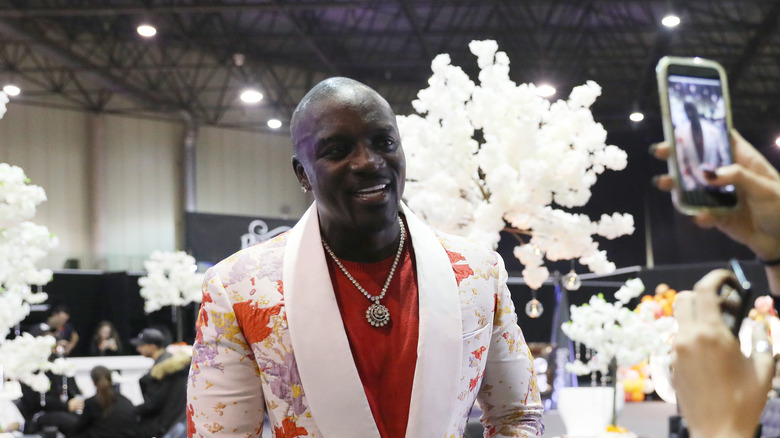 Akon posing for a photo