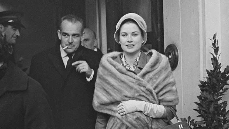 Prince Rainier smoking, Grace Kelly smiling