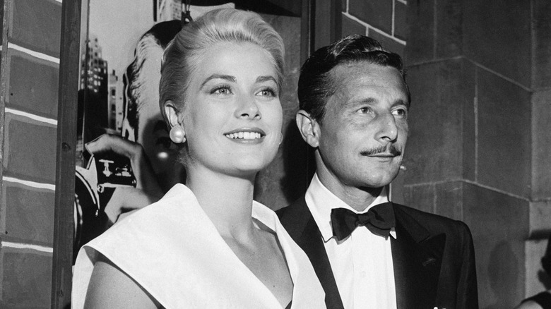 Grace Kelly and Oleg Cassini posing together 