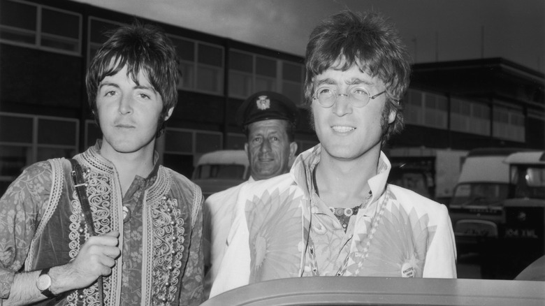 Paul McCartney and John Lennon on the street