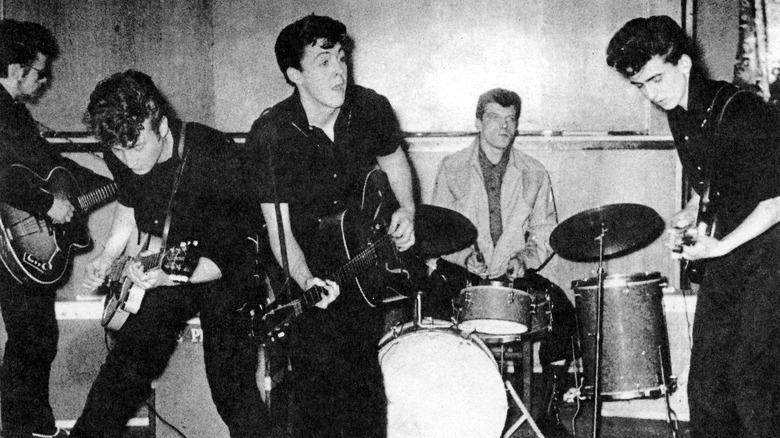 The Beatles performing in 1960