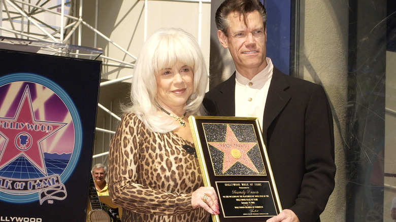 Randy Travis and Lib Hatcher-Travis with a star on the Hollywood Walk of Fame