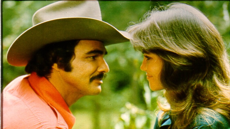 Burt Reynolds and Sally Field looking at each other