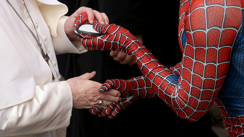 Spider-Man and Pope Francis shake