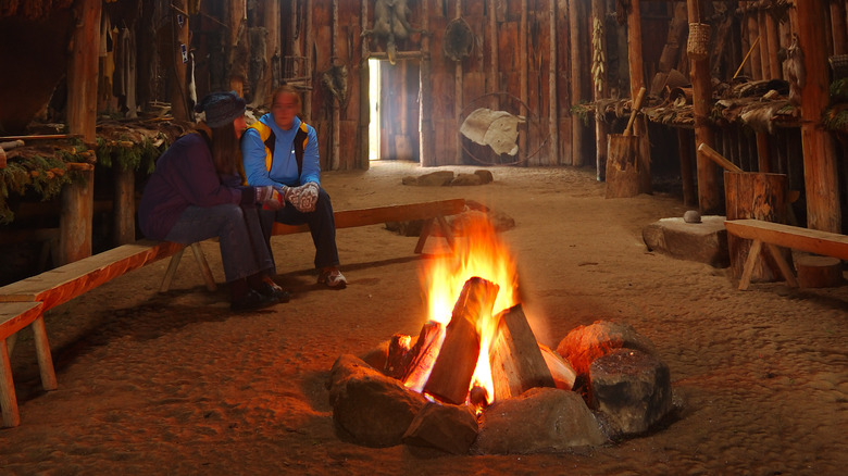 Fire inside Iroquois longhouse